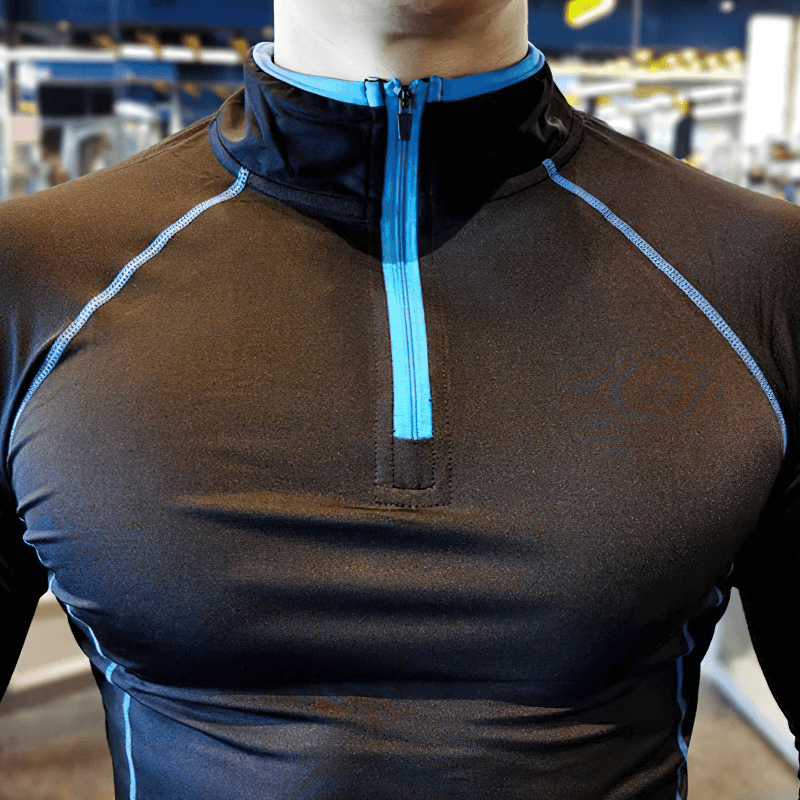 Quarter-Zip Long Sleeves Compression Bodybuilding Top in black spandex, ideal for male strength training, featuring a blue half zipper.